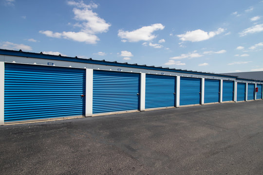 Row of blue storage unit doors